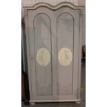 An 18th century style grey painted double arch wardrobe on bun feet, 98cm wide x 183cm high.