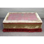 A large rectangular green velvet upholstered coffee table/foot stool, 140cm wide x 41cm high.