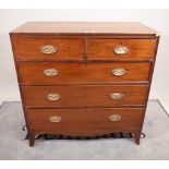 A George III mahogany chest with two short and three long graduated drawers on bracket feet,