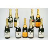 Nine bottles of mixed champagne, comprising; two Veuve Clicquot Ponsardin, 1985 Champagne Deutz,
