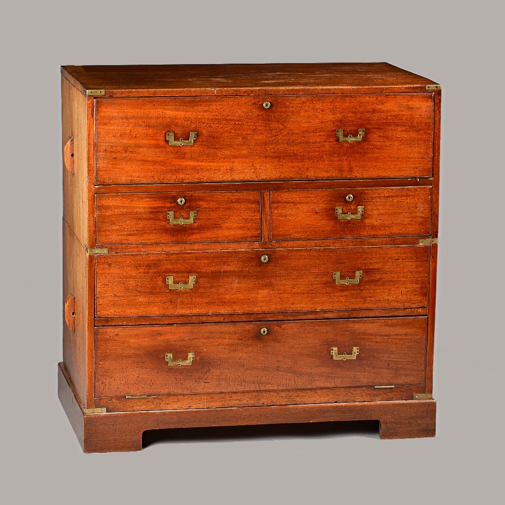 A mid-19th century teak two part secretaire campaign chest,