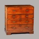 A mid-19th century teak two part secretaire campaign chest,