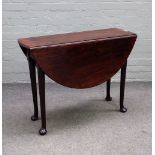 A mid-18th century mahogany oval drop flap dining table, on pad feet, 97cm wide x 71cm high.