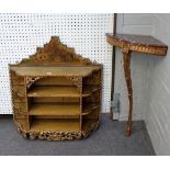 A set of 19th century gilt and polychrome painted hanging four tier wall shelves,