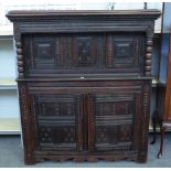 A 17th century and later oak court cupboard with raised double panel doors,
