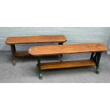 Two 19th century and later benches, each with stained pine tops on green painted cast iron supports,