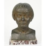 A patinated bronze bust of a young girl, incised signature 'A.