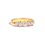 An 18ct gold and diamond set five stone ring,