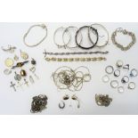Mostly silver jewellery, comprising; an amethyst set bangle, three further bangles,