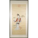Chinese school, 20th century, a painting on silk of a young woman holding flowers, signed,