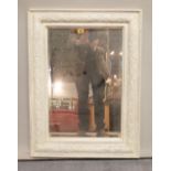 A Victorian style white painted rectangular wall mirror, 60cm wide x 80cm high.