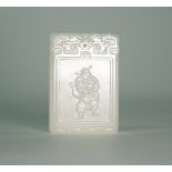 A Chinese white jade rectangular pendant, carved on one side with a warrior,