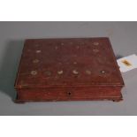 An early 20th century French embossed red leather stationery cum writing box.