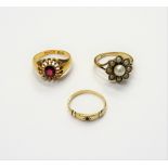 An 18ct gold ring, mounted with an oval cut ruby, Birmingham 1902, ring size O and a half,