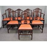 A set of eight George III style mahogany dining chairs, on square supports,