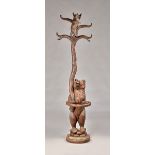 A 19th century Black Forest bear stick stand modelled as a mother and cub in a tree, 197cm high.
