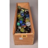 A quantity of Victorian and later glass marbles, (qty).