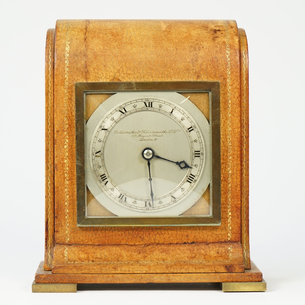 An Edwardian leather desk timepiece retailed by the Goldsmiths & Silversmiths, London, by Elliott,