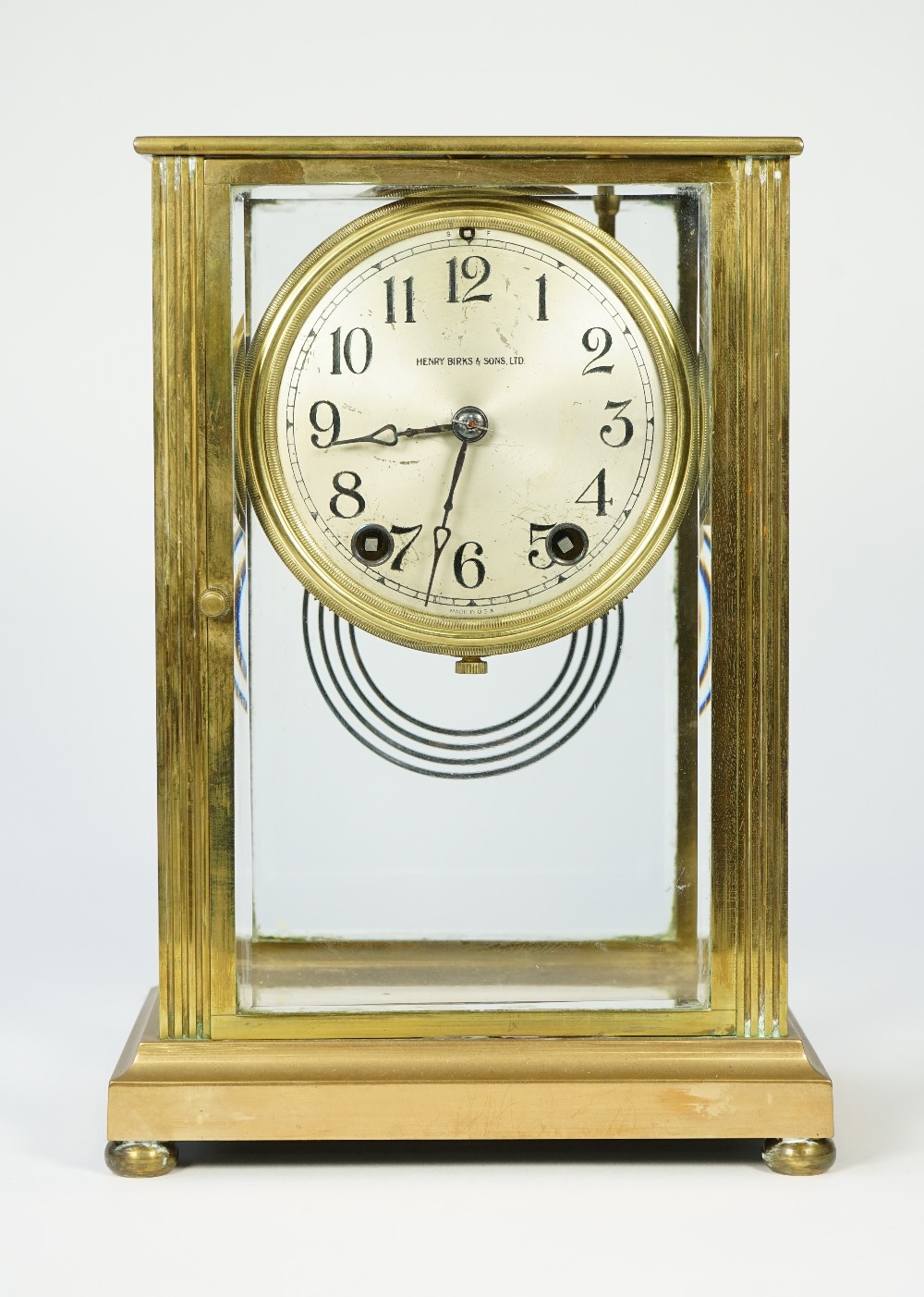A brass cased four glass mantel clock, early 20th century,