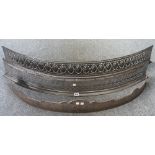 An Empire steel fire kerb, with pierced bowfront and stepped plinth, 108cm wide,