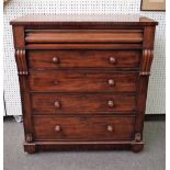 An early Victorian mahogany chest, with cushion frieze drawer over dummy drop drawer,