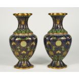 A pair of Chinese cloisonné vases, circa 1900, of quatrelobed baluster form,