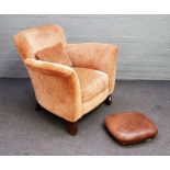 John Sankey; a modern easy armchair on tapering splayed block supports,