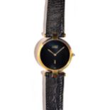 A Cartier Paris Quartz silver gilt circular cased wristwatch,