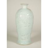 A Chinese blue glazed porcelain slender baluster vase, probably 19th century,