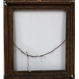 A group of four 19th and early 20th century gilt plaster frames, the largest aperture 67.5cm x 56.