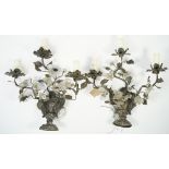 A pair of 19th century white metal and glass three light wall appliques,