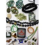 A collection of costume jewellery, including turquoise matrix beads,