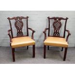 A pair of 18th century mahogany carver chairs with pierced latticed splat and blind floral fret