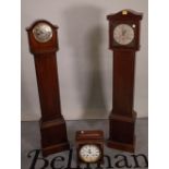 An early 20th century 8 day oak longcase clock, 27cm wide x 135cm high and another similar,