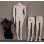 A modern white shop mannequin formed as a child,