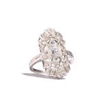 A platinum and diamond set ring, of pierced panel shaped form, mounted with circular cut diamonds,