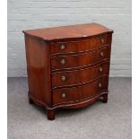 A George III style mahogany serpentine chest with four long graduated drawers on bracket feet,