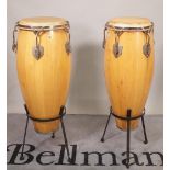 Two similar bongo type drums on stands, (2).