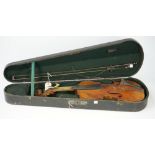 A Continental violin, early 20th century, with bow and hard case, back measures, 14 1/4 inches,