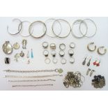 Mostly silver jewellery, comprising; twelve rings, ten pendants and lockets, seven bangles,