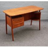 Gunnar Nielsen Tibergaard Denmark; a teak desk, circa 1970,