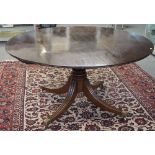 A George III mahogany breakfast table,