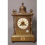 A 19th century brass cased mantel clock, 18cm wide x 34cm high.