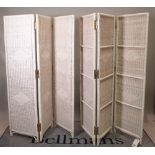 A pair of white painted rattan three fold screens,