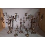 Silver plated wares; three pairs of twin branch candelabra,