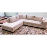 Natuzzi; a modern brushed suede upholstered corner sofa, on block supports, 230cm x 275cm.