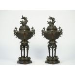 A pair of Japanese bronze vases and covers, early 20th century,