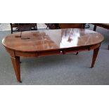 A 19th century satinwood banded circular mahogany extending dining table,