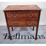 A late George III mahogany two drawer side table, on tapering square supports,