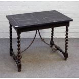 A 17th century style Italian ebonised rectangular centre table on barley-twist supports united by
